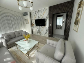 Rron Rrust flat